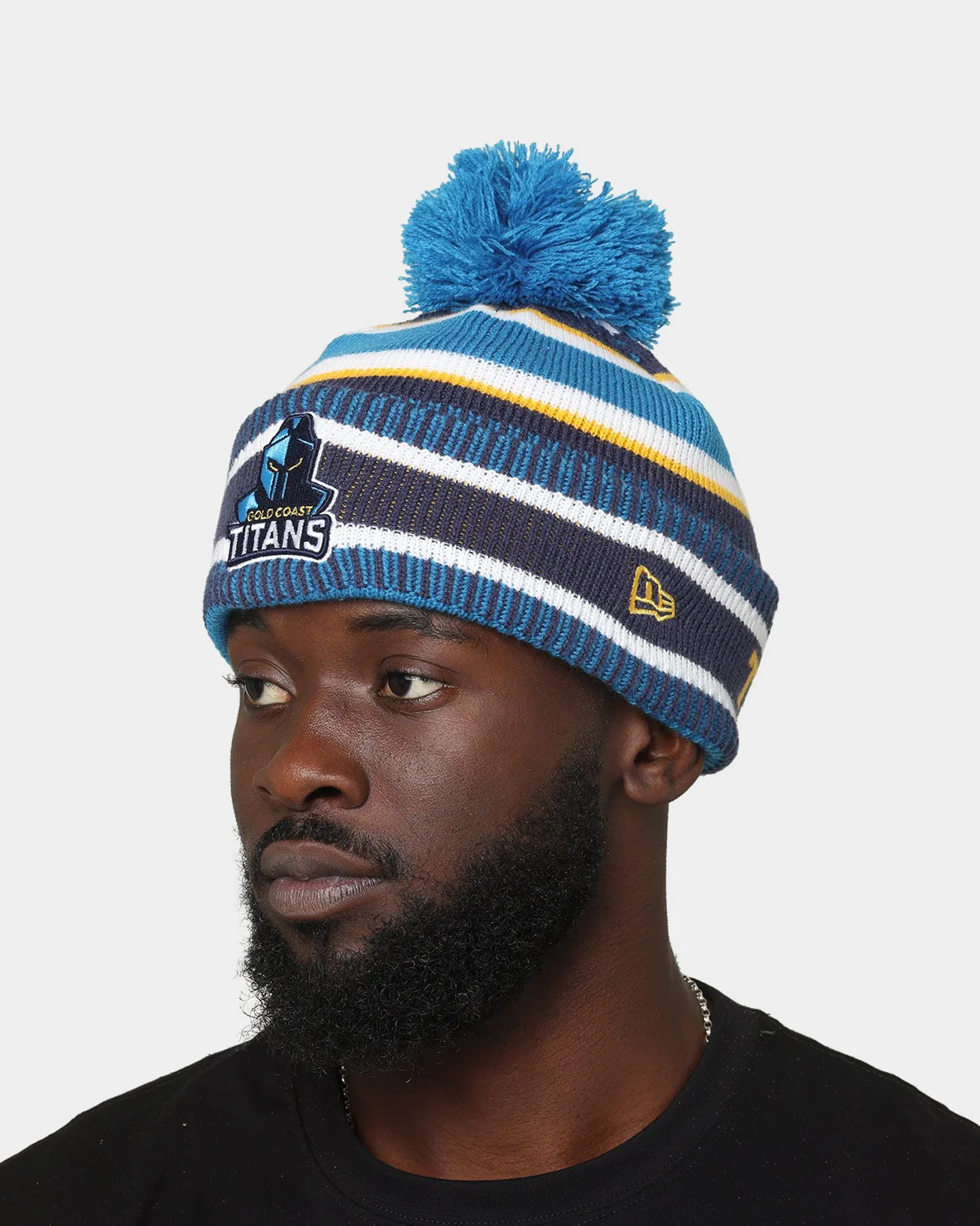 New Era Gold Coast Titans NRL Kick Off 2022 Pom Wordmark Beanie Medium Blue