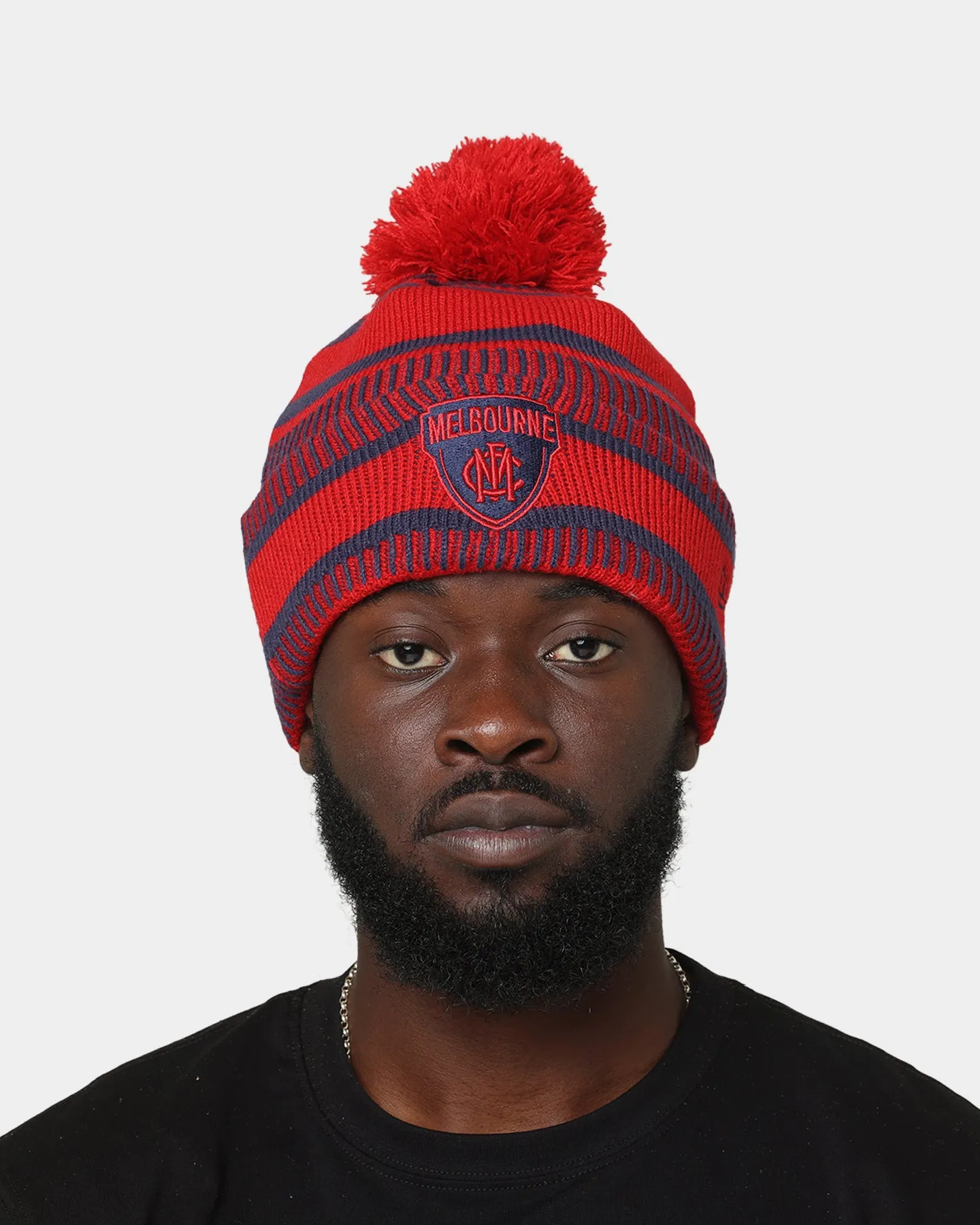 New Era Melbourne Demons AFL Opening Bounce 2022 EST Pom Wordmark Beanie Navy