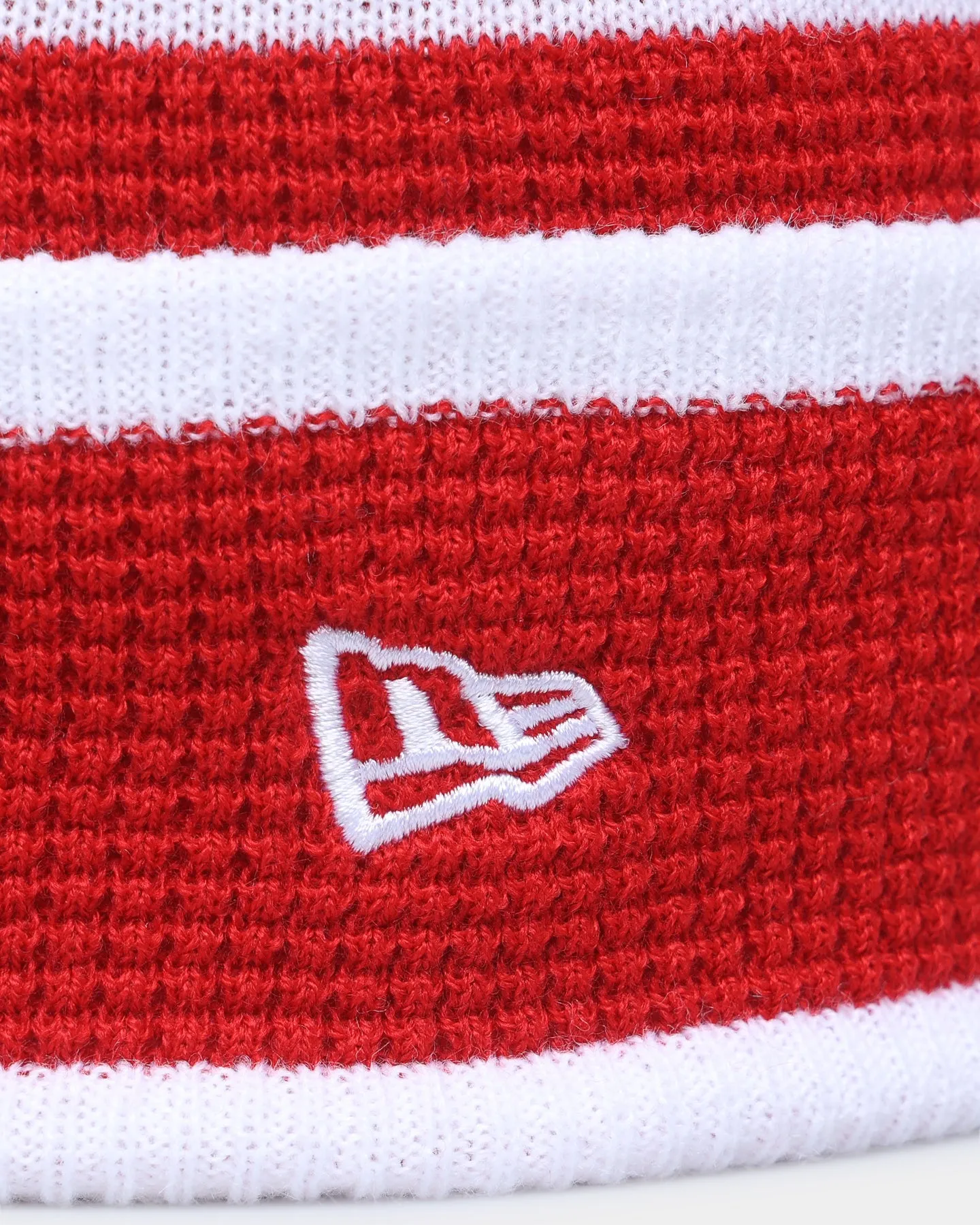 New Era Sydney Swans AFL Opening Bounce 2022 Pom Waffle Wordmark Beanie Red