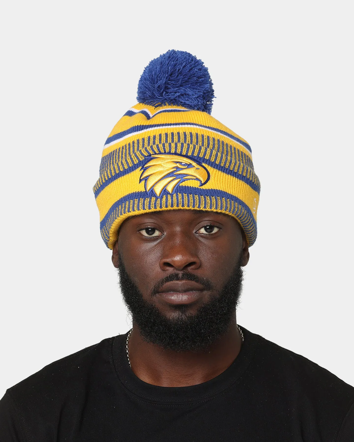 New Era West Coast Eagles AFL Opening Bounce 2022 Pom Wordmark Beanie Medium Blue